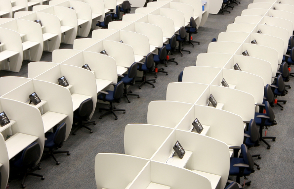 Call center workstations with privacy partitions